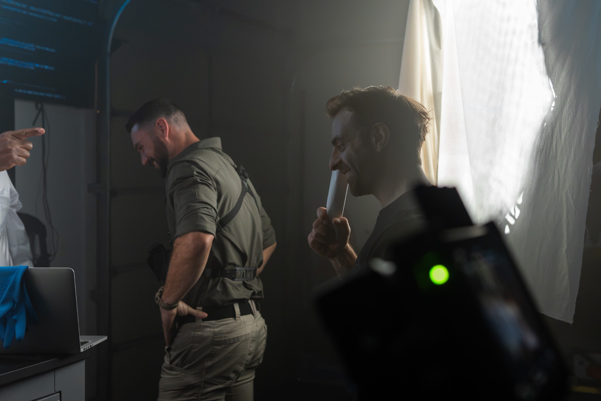 Crew filming an interior dramatic scene